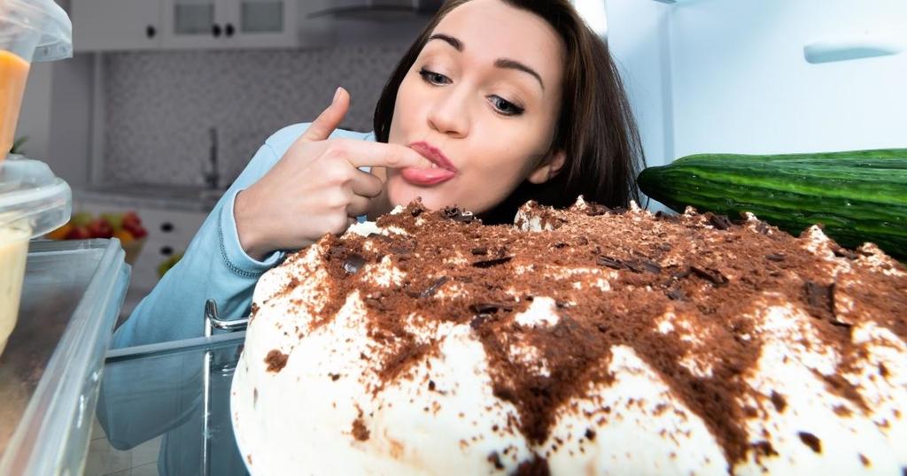 woman tasting cake the bailiwick academy