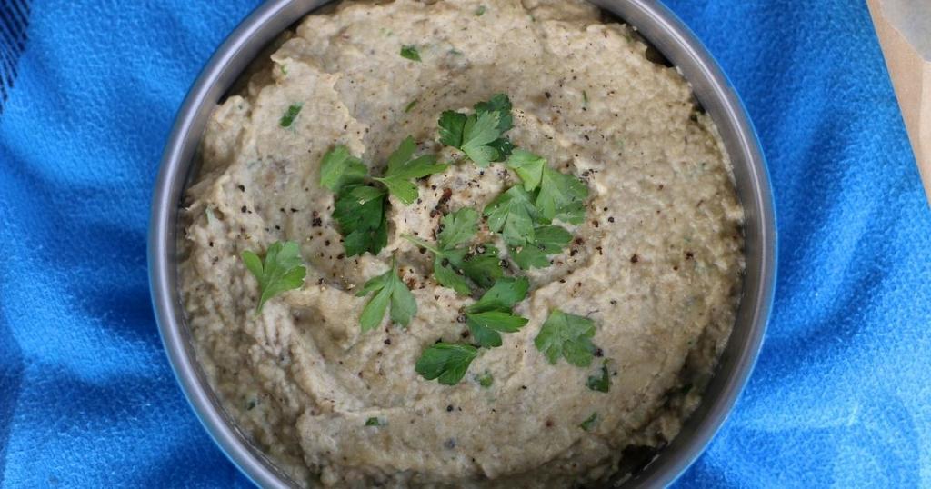 Baba Ghannouj in a bowl on a blue cloth the bailiwick academy